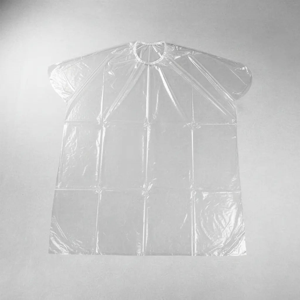 Pack 50 Capas Desechables Impermeables para Barbería y Peluquería
